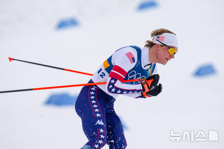 [테세로=AP/뉴시스] 미국의 노르딕복합 선수 니클라스 말라친스키가 17일(현지 시간) 이탈리아 테세로 크로스컨트리 스키 스타디움에서 열린 2026 밀라노·코르티나담페초 동계올림픽 노르딕복합 개인 군데르센 라지힐(10㎞) 경기를 치르고있다. 2026.02.18.