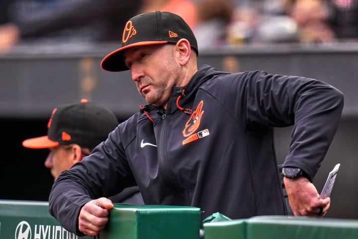 Baltimore Orioles manager Craig Albernaz looks out from the dugout during the second inning of a baseball game against the Pittsburgh Pirates in Pittsburgh, Sunday, April 5, 2026. (AP Photo/Gene J. Puskar)