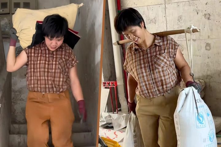 [서울=뉴시스] 중국의 한 40대 싱글맘이 생계를 책임지기 위해 건설 현장에서 시멘트 포대를 날라 화제다. (사진=도우인)