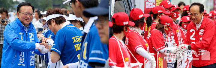 [대구=뉴시스] 이무열 기자 = 제9회 전국동시지방선거 공식 선거운동 첫날인 21일 오전 김부겸 더불어민주당 대구시장 후보(왼쪽)가 대구 수성구 범어네거리에서, 추경호 국민의힘 대구시장 후보가 대구 중구 반월당네거리에서 각각 선거운동원들과 악수하고 있다. 2026.05.21. lmy@newsis.com