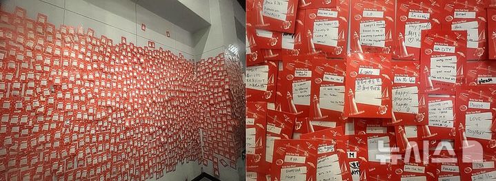 [부산=뉴시스] 진민현 기자 = 11일 오후 부산 동구 부산역 문화 쉼터 부산유라시아플랫폼 내 BTS 웰컴센터에 마련된 응원 메시지 공간이 국내외 팬들이 남긴 포스트잇으로 가득 차 있다. 팬들은 다양한 언어로 BTS를 향한 응원과 공연 기대감을 적어 남겼다. 2026.06.11 truth@newsis.com