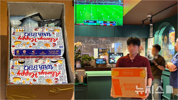 [서울=뉴시스] 권민지 기자 = 서울시 중구에 위치한 BBQ치킨 을지로입구점. 단체주문을 한 고객이 큰 박스에 치킨을 포장해가고 있는 모습. 2026.06.12. ming@newsis.com