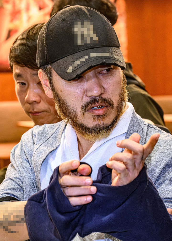 [인천공항=뉴시스] 정병혁 기자 = 필리핀에서 이른바 '전세계'라는 활동명으로 마약을 유통했던 박왕열이 25일 인천국제공항 제2터미널을 통해 송환되고 있다. (공동취재) 2026.03.25. photo@newsis.com *재판매 및 DB 금지