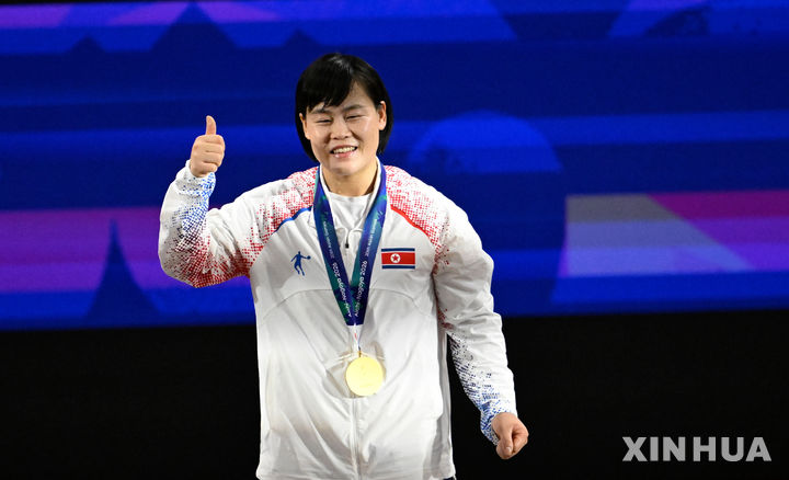 [나고야=신화/뉴시스] 북한 역도 국가대표 송국향, 2026 아이치·나고야 아시안게임 여자 69㎏급 우승. 2026.09.27.
