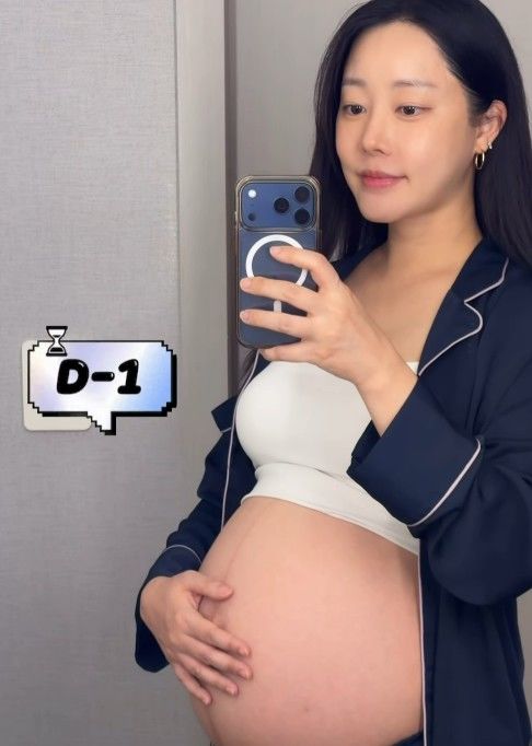 [서울=뉴시스] 고우리가 만삭의 모습을 영상으로 담는 모습이다. (사진= 고우리 SNS 캡처) 2026.10.06. photo@newsis.com *재판매 및 DB 금지